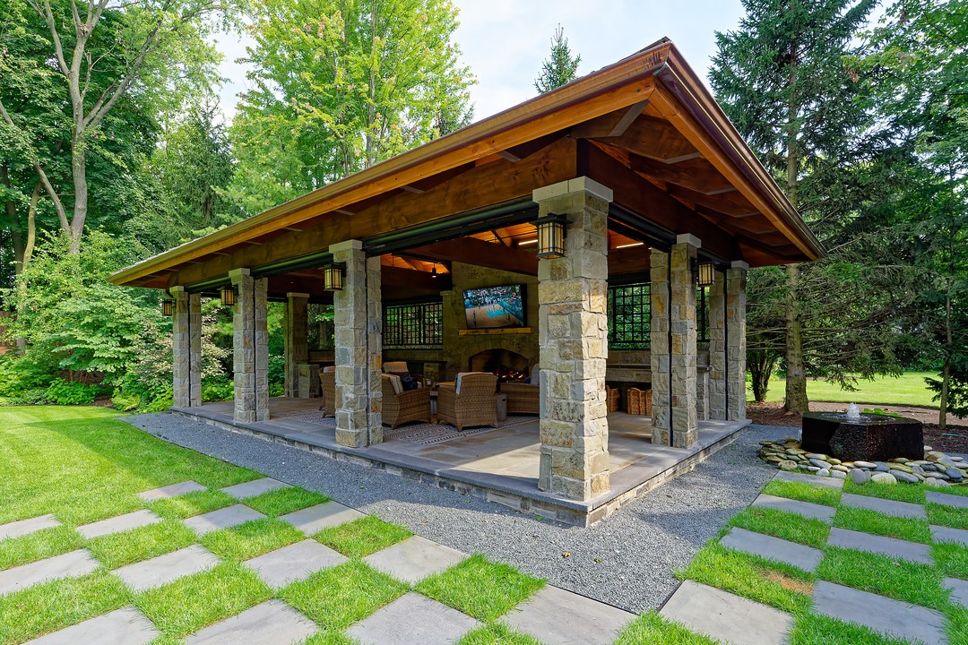 9. Sun-dappled Serenity: a Pavilion with Wisteria Canopy and Stone Pathway