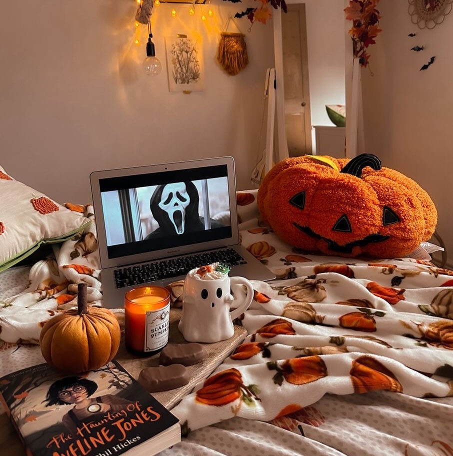 11. Spooky Silhouettes and Crimson Ribbons Entwined In a Cobweb Canopy