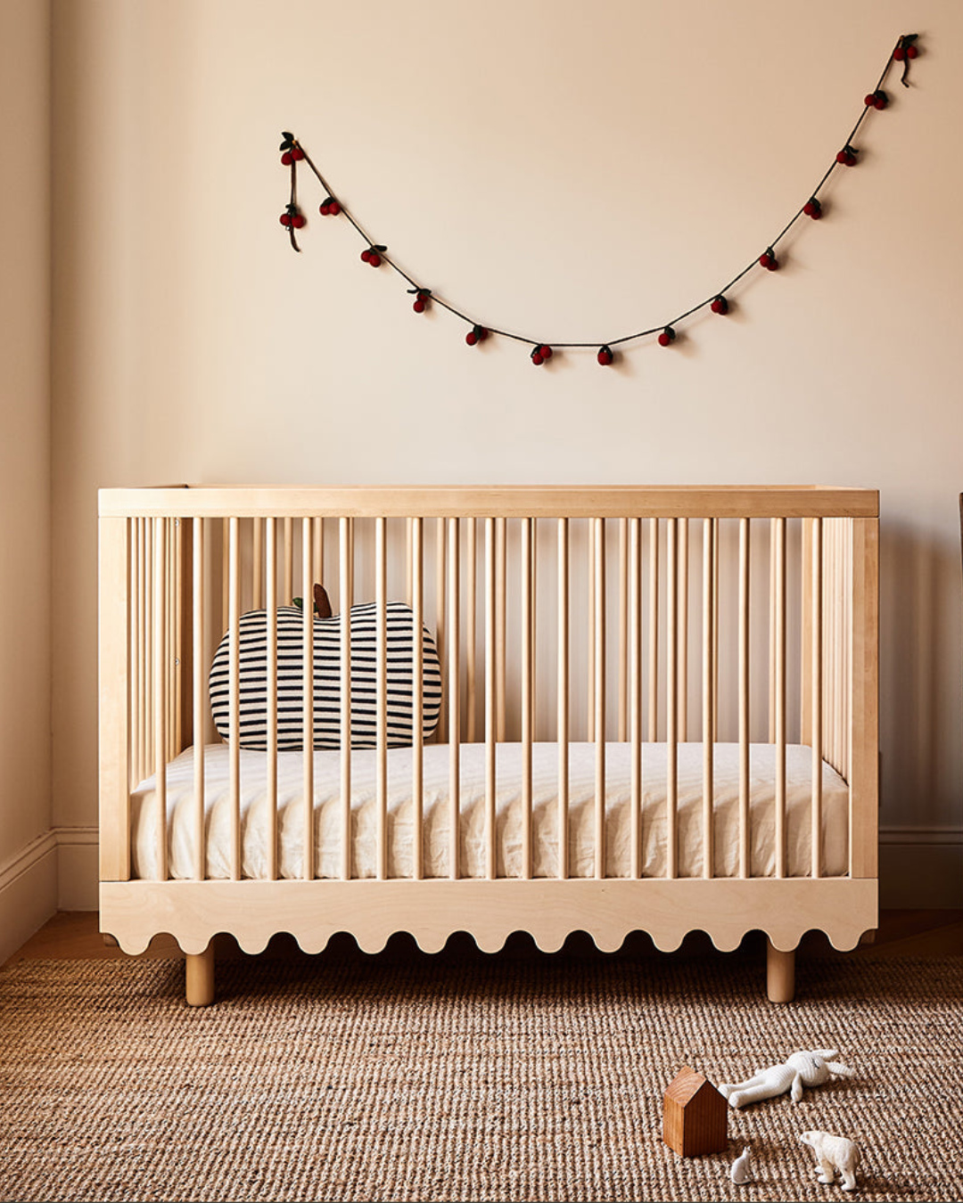 4. the Geometric Serenity Of a Single Wooden Crib Against a Crisp White Wall