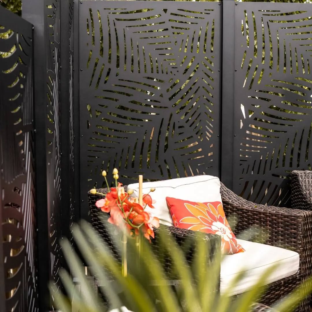 22. a Lush Green Wall Of Bamboo and Wooden Slats Creating a Zen Retreat