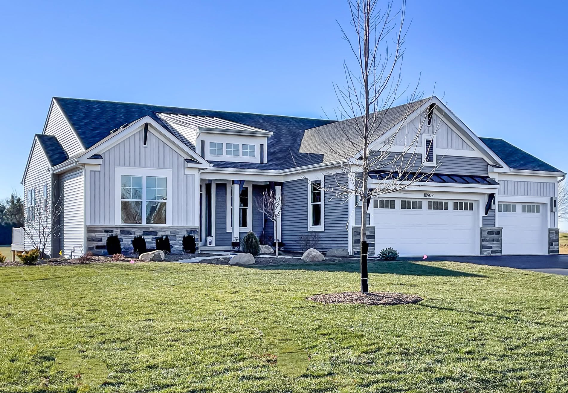24. the Sun-kissed Adobe with Crimson Accents and a Whispering Windmill
