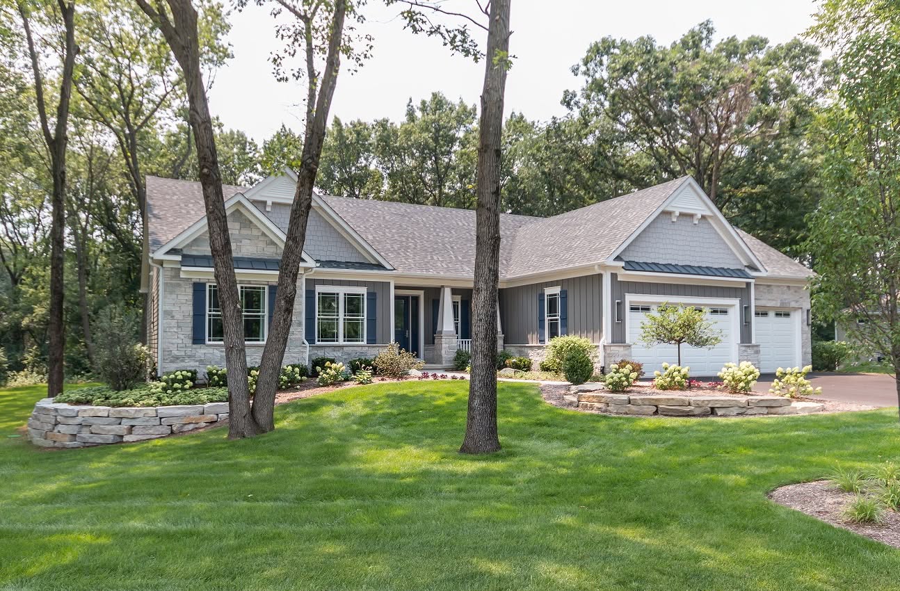 11. Sunlit Adobe Facade with Terracotta Tiles and Rustic Wooden Accents