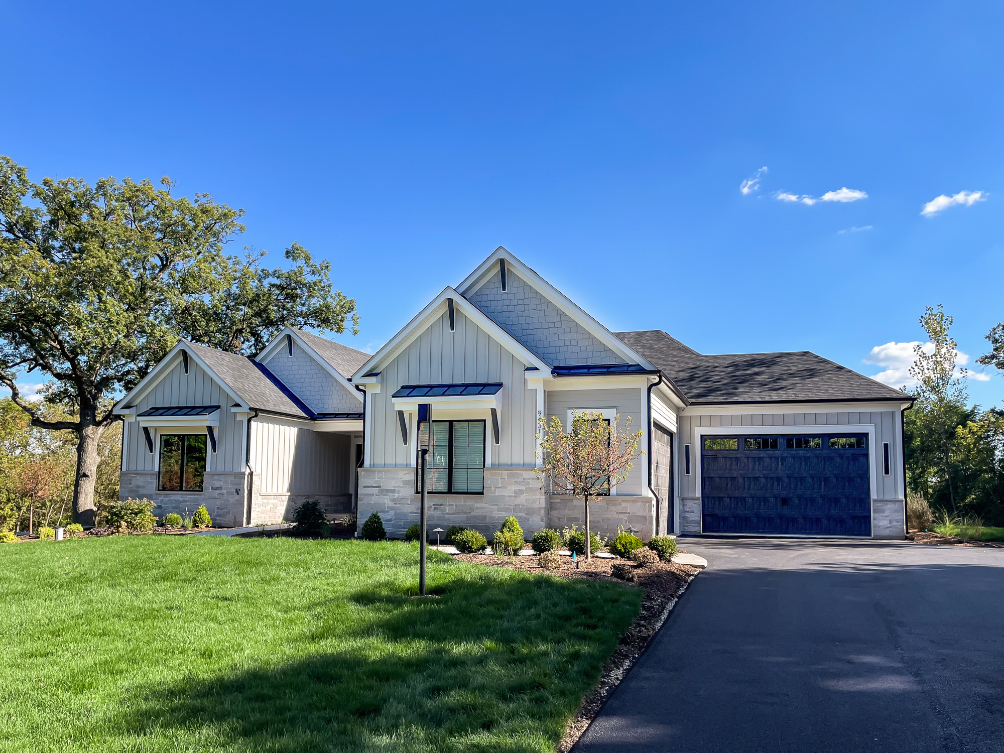 5. Ranch House with Terracotta Tiles and Olive Green Shutters Nestled In Lush Greenery