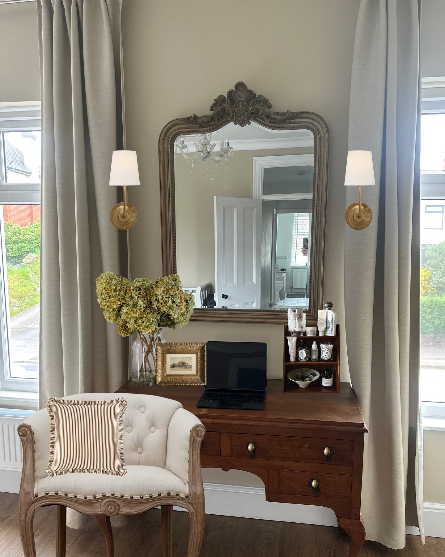 12. a Symphony Of Softness: Blush Pink Vanity with Antique Gold Accents