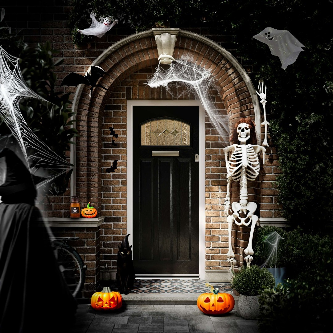 10. Spooky Cobweb Garland with Glittering Black Spiders and Blood-dripping Bats