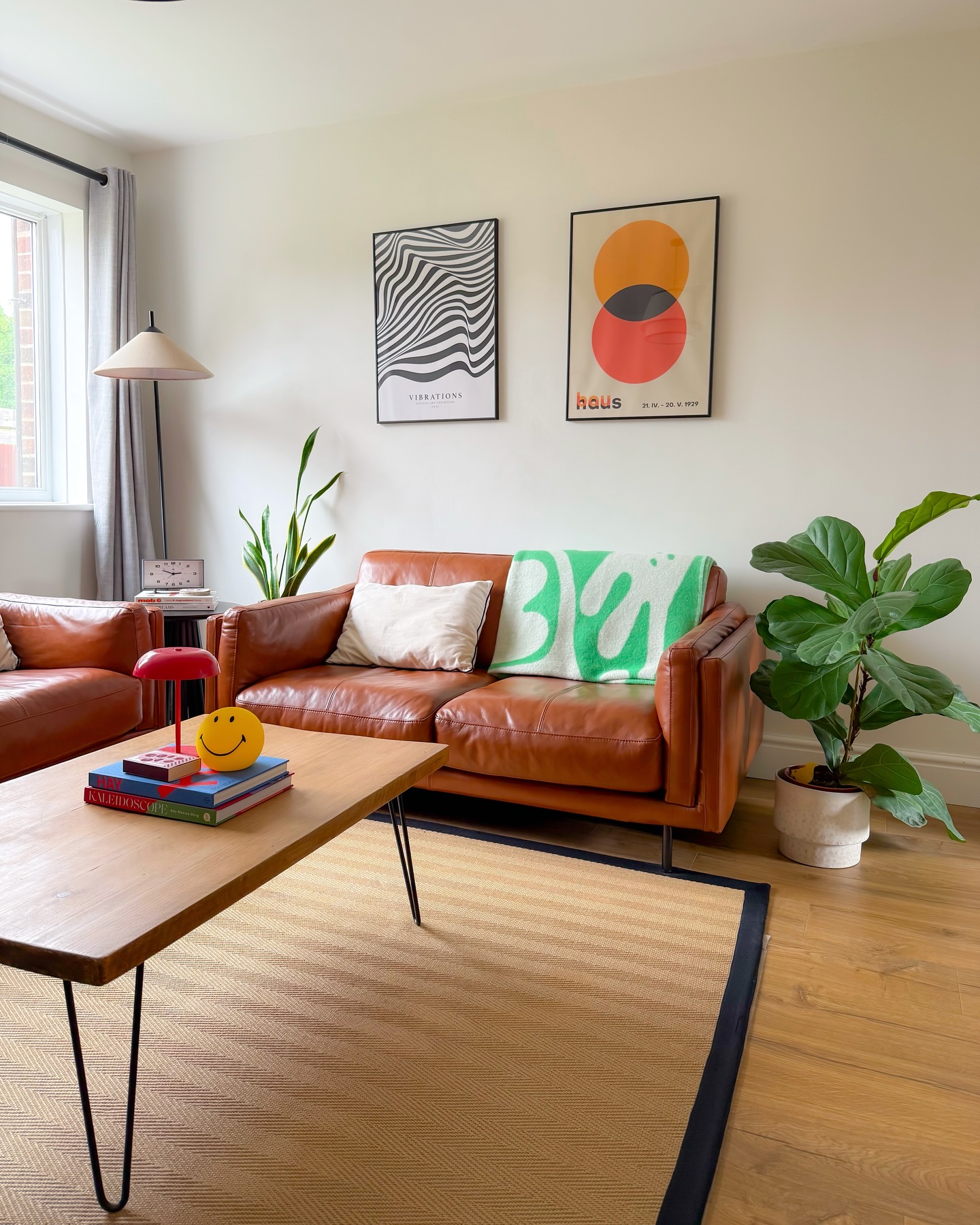 6. Velvet Embrace: the Petite Sofa with Gold Legs In a Cozy Nook