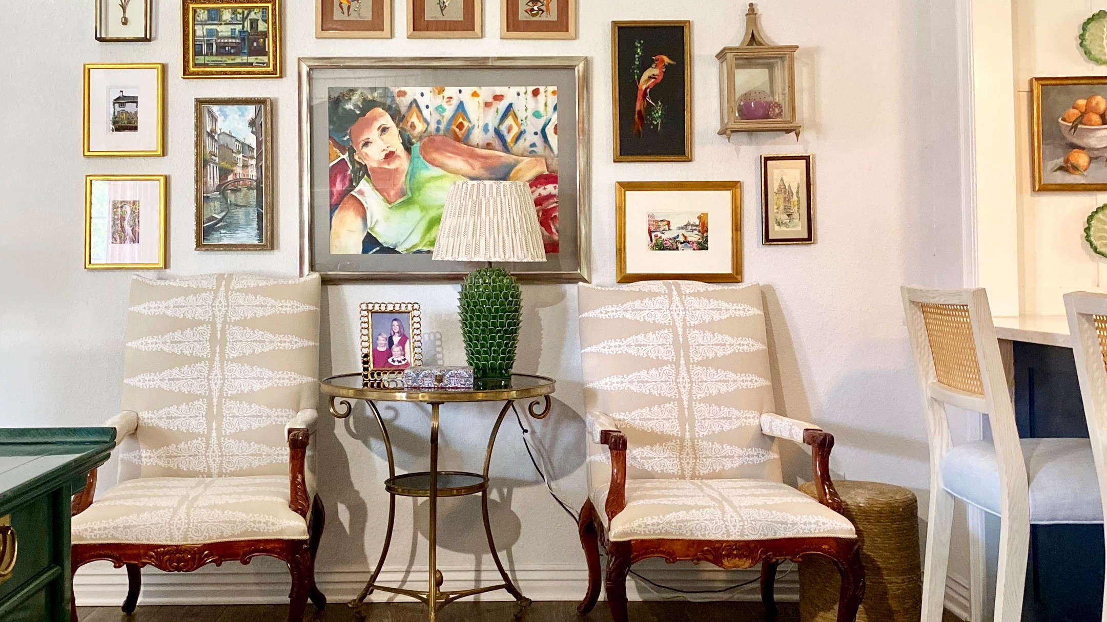 4. Velvet Curtains Frame a Monochrome Gallery Of Vintage Portraits