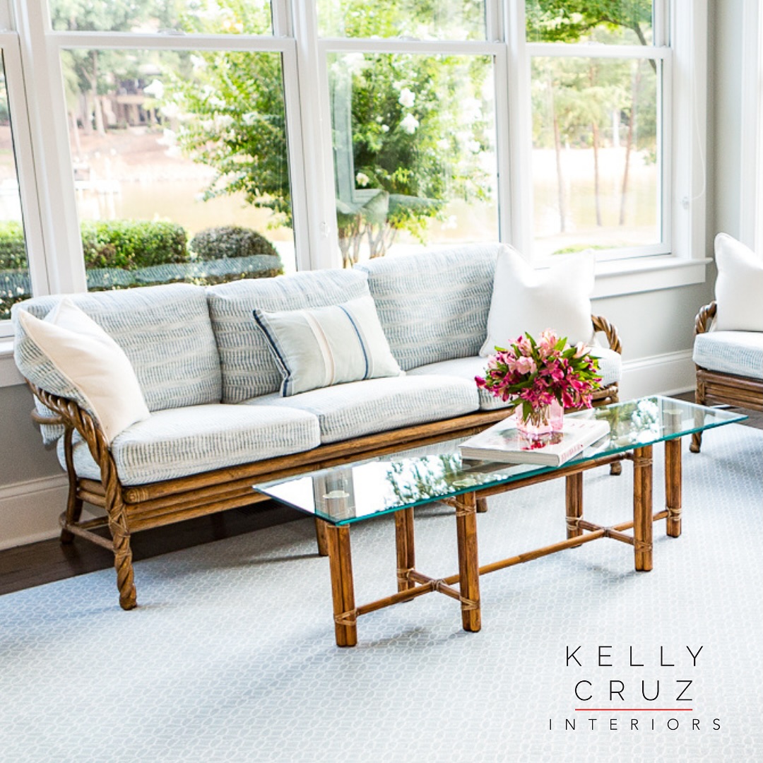 23. Sunlit Serenity with Wicker and Wood: a Haven Of Striped Cushions and Ferns