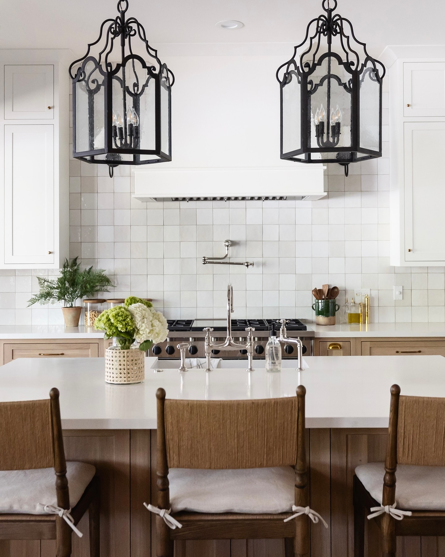 8. Glossy Subway Tiles Meet Matte Grout In a Crisp White Kitchen Backsplash