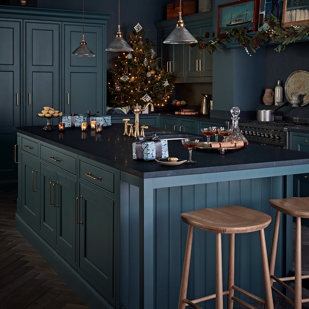 22. Crimson Cranberry Garland Wrapped Around a Vintage Copper Saucepan with Festive Spruce Accents