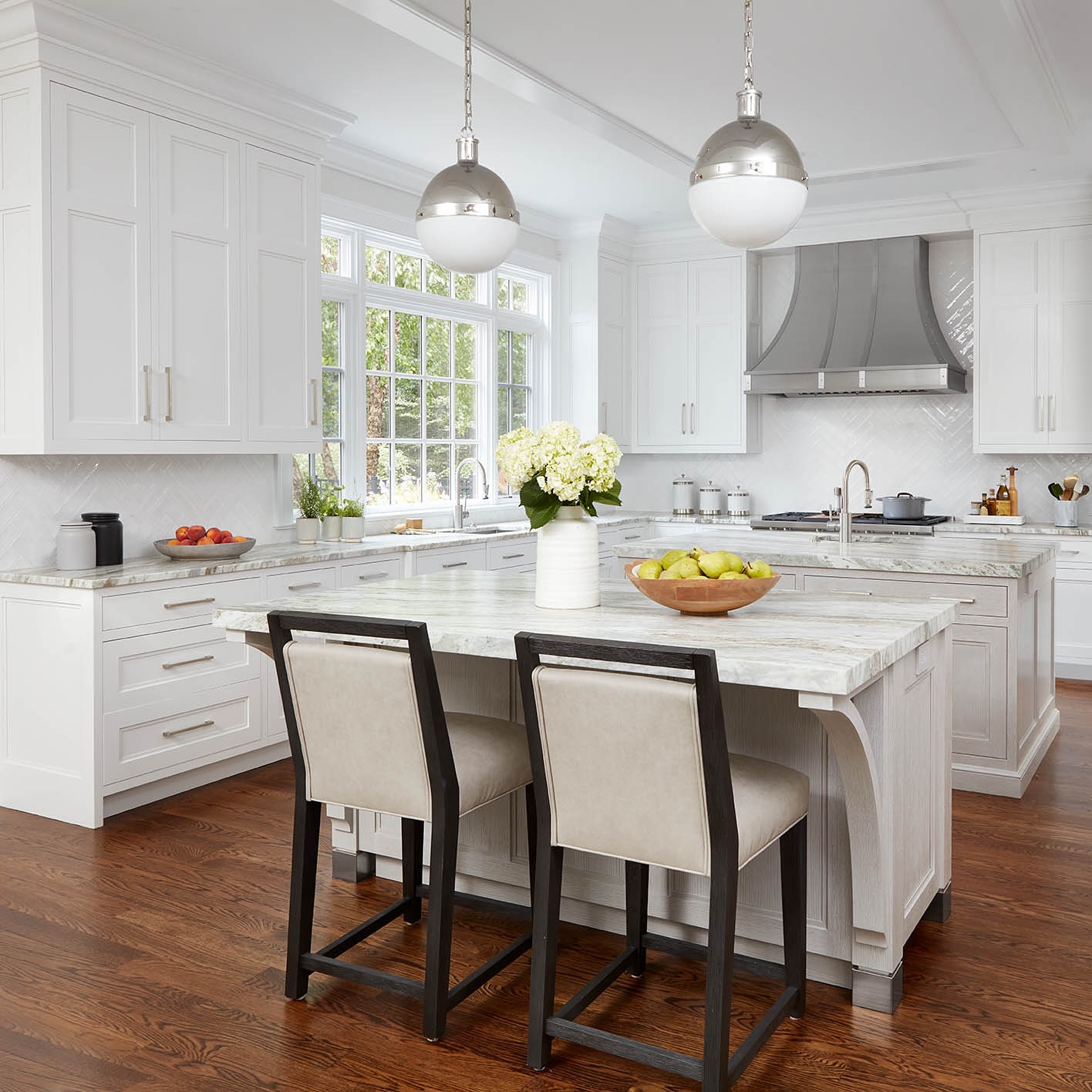 17. White Quartz Herringbone with Matte Black Accents and Brass Hardware