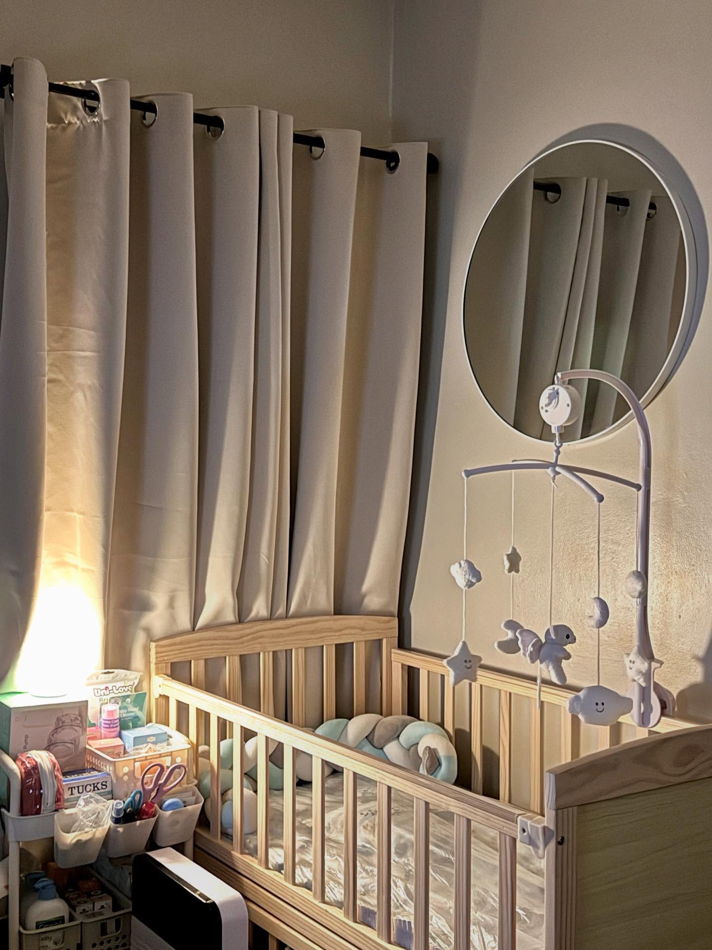 9. Tiny Greenhouse Crib with Fairy Lights and Hanging Plants