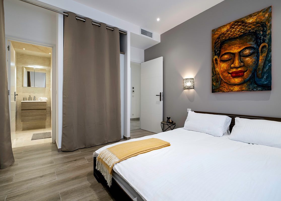 20. Moonlit Romance: Silver Accents and Draped Canopy Bed In Soft Pastels