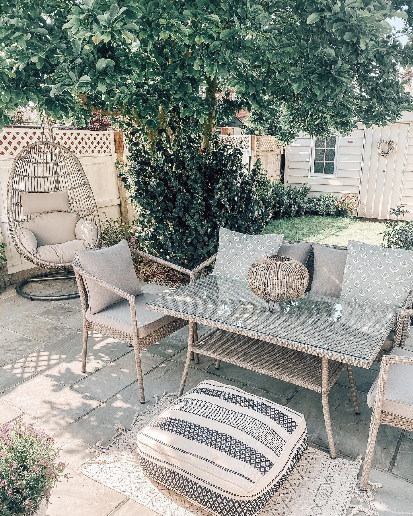 19. Sun-dappled String Lights and Terracotta Serenity: a Budget-friendly Patio Oasis