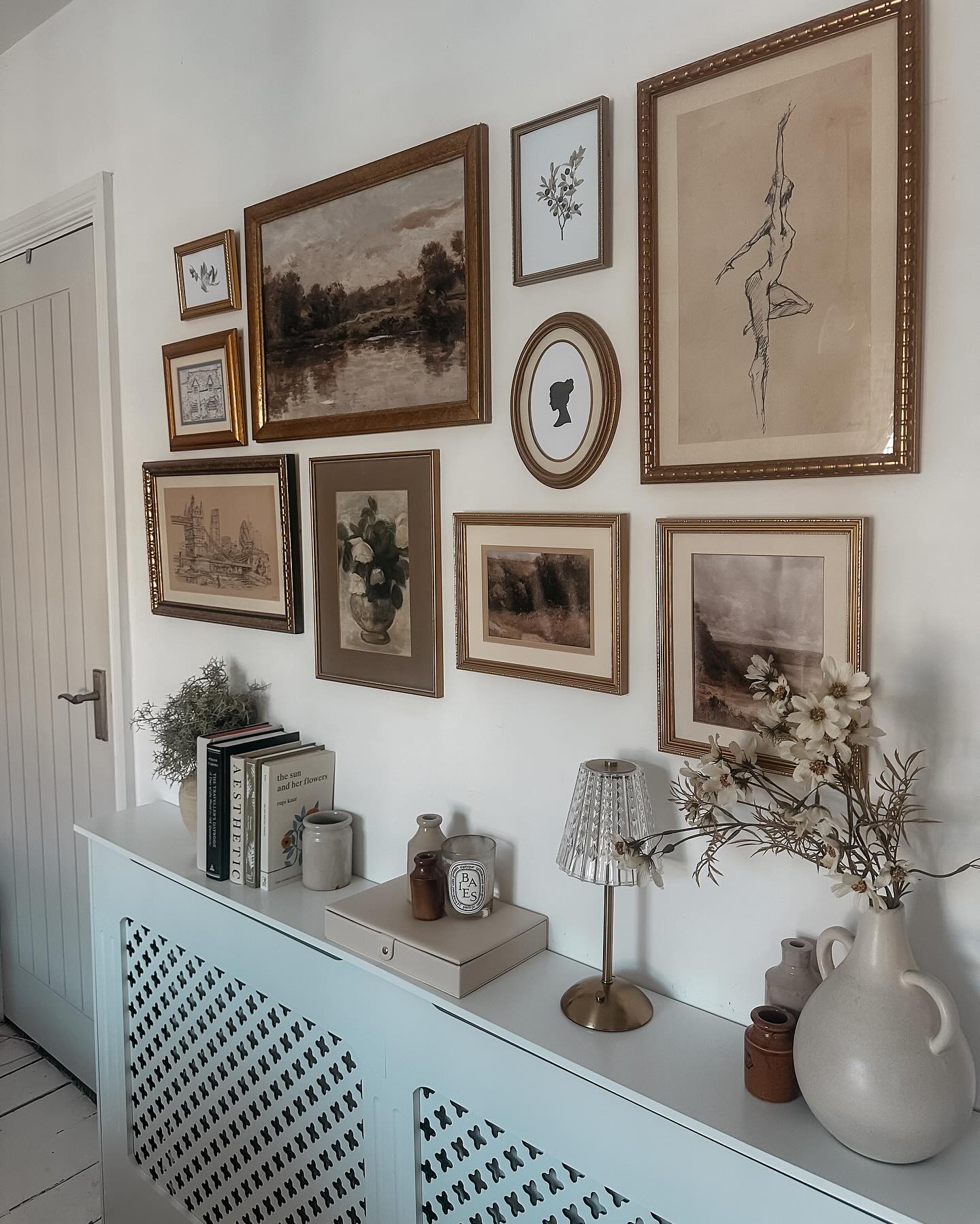 12. a Trio Of Eclectic Frames with a Vintage Map and Brass Accents