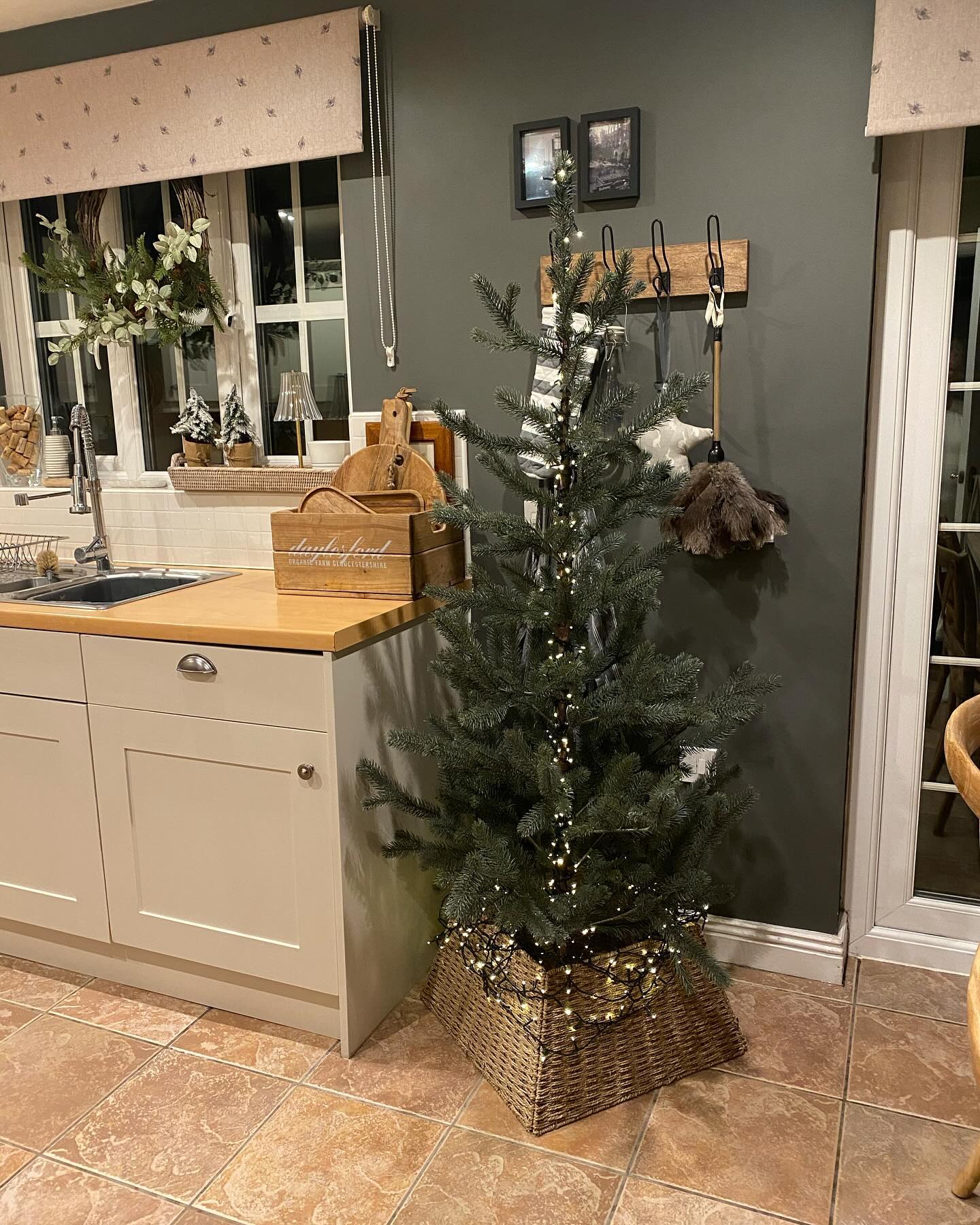 26. Festive Reindeer Silhouette Amidst Crimson Baubles and Golden Twigs