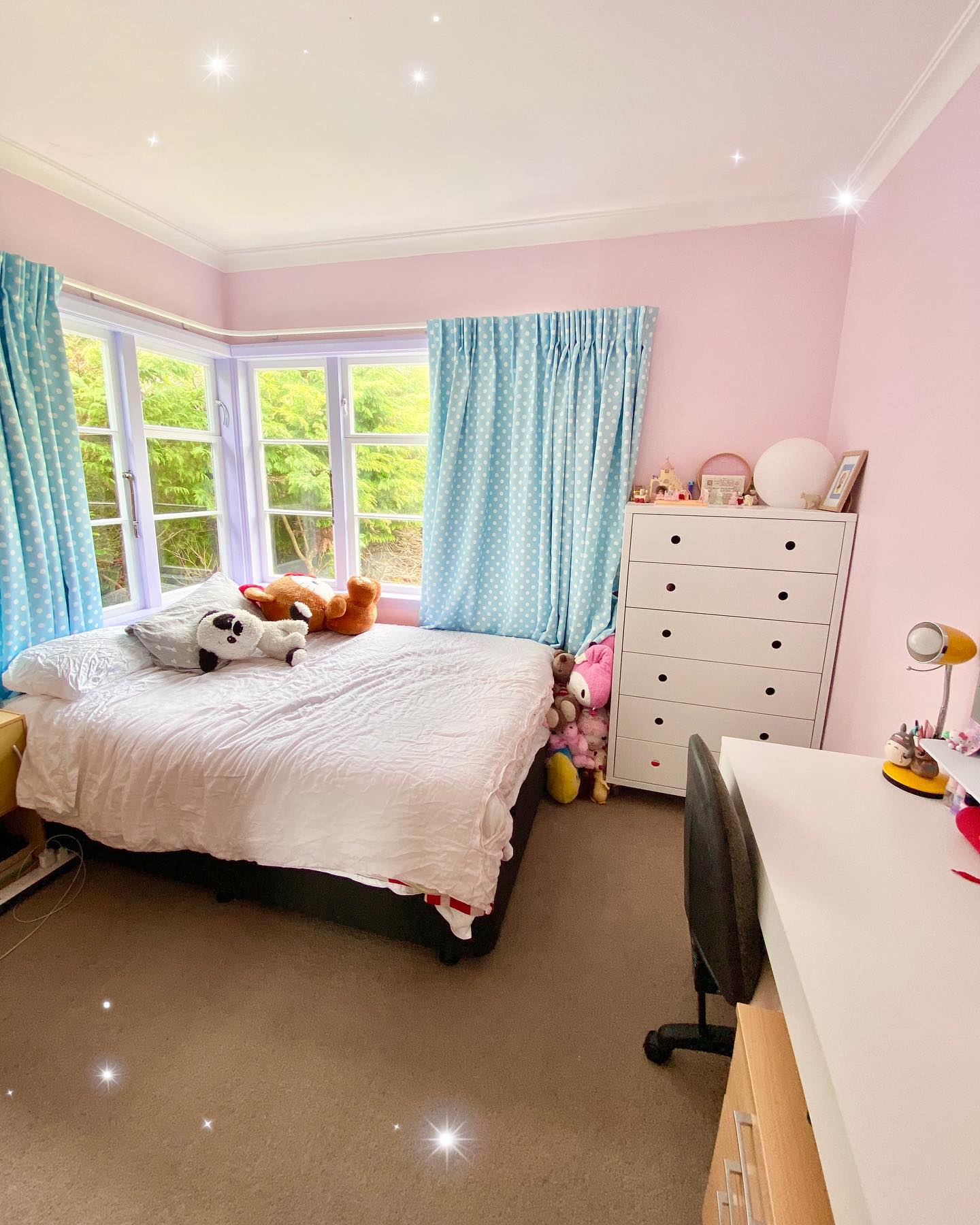 23. Moonlit Whimsy: a Bedroom with Starry Canopy and Fairy Light Magic