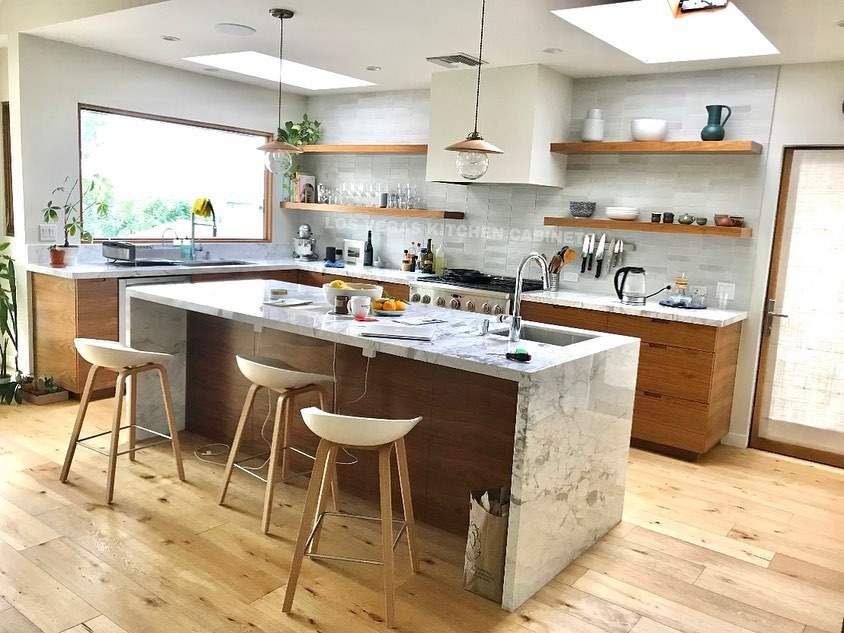 45. Moonlit Marble Countertops and Teal Cabinets: a Celestial Kitchen Design