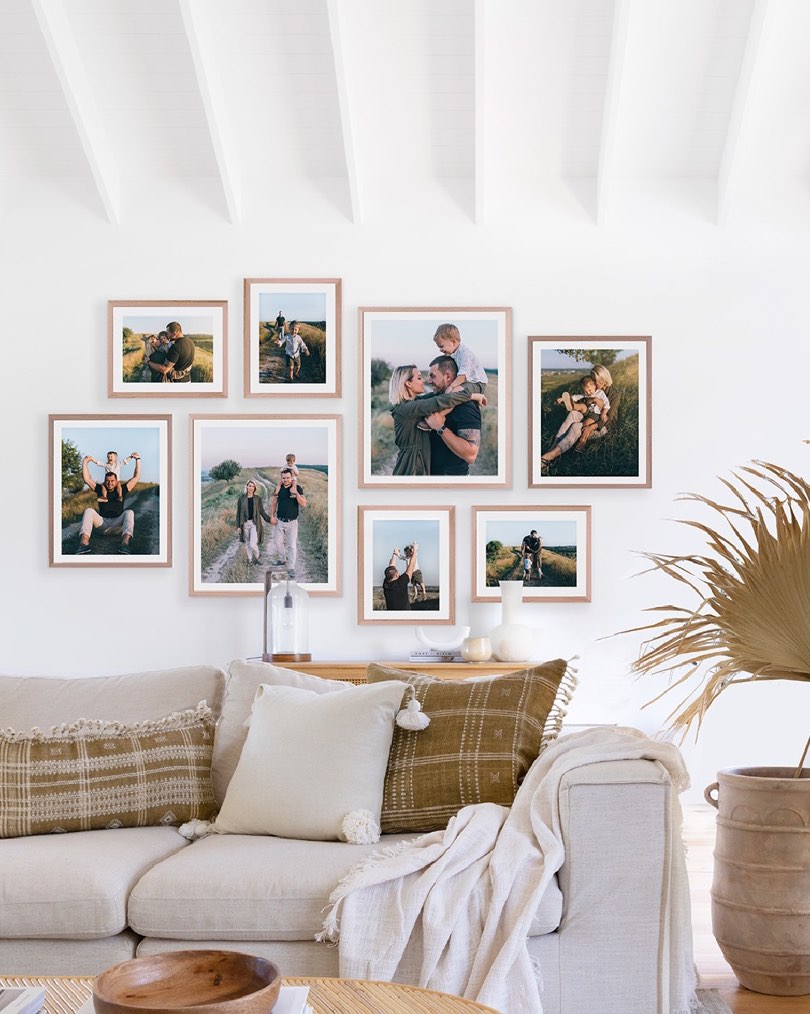 26. a Tapestry Of Memories: Woven Baskets and Family Photos on a Warm Beige Wall