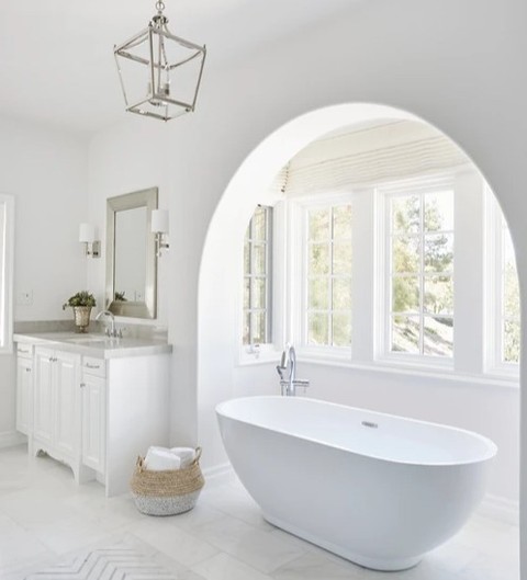 29. the Mosaic Mirror and Teal Towel Contrast In a Compact Space