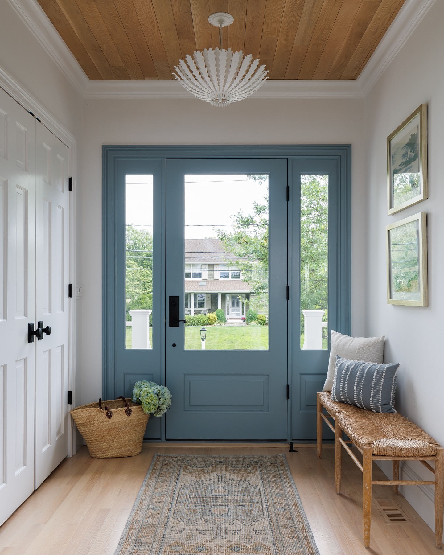 18. the Crimson Chandelier and Geometric Rug Foyer Fusion
