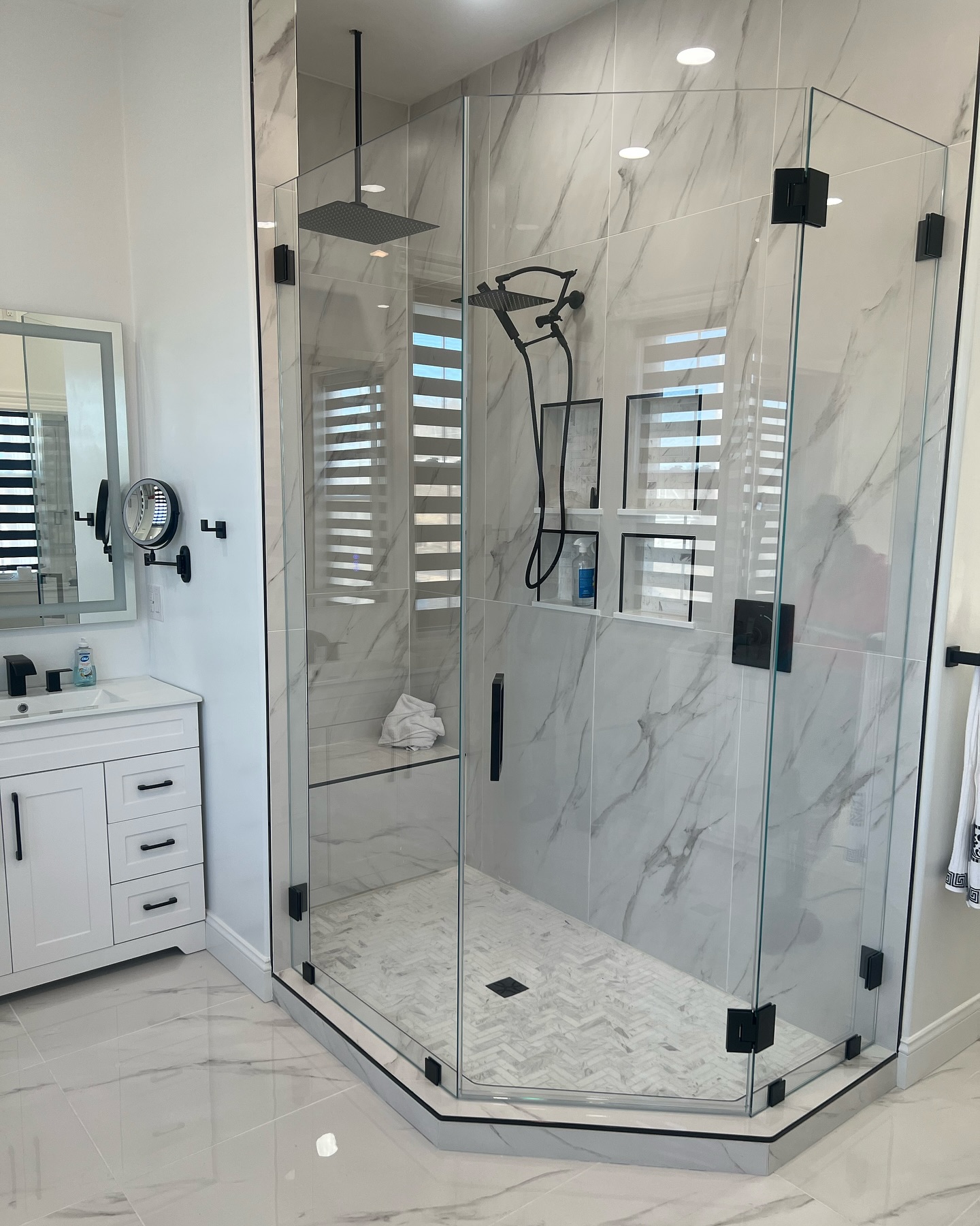 9. Forest Green Serenity: a Budget-friendly Bathroom with Nature-inspired Tiles and Brass Accents