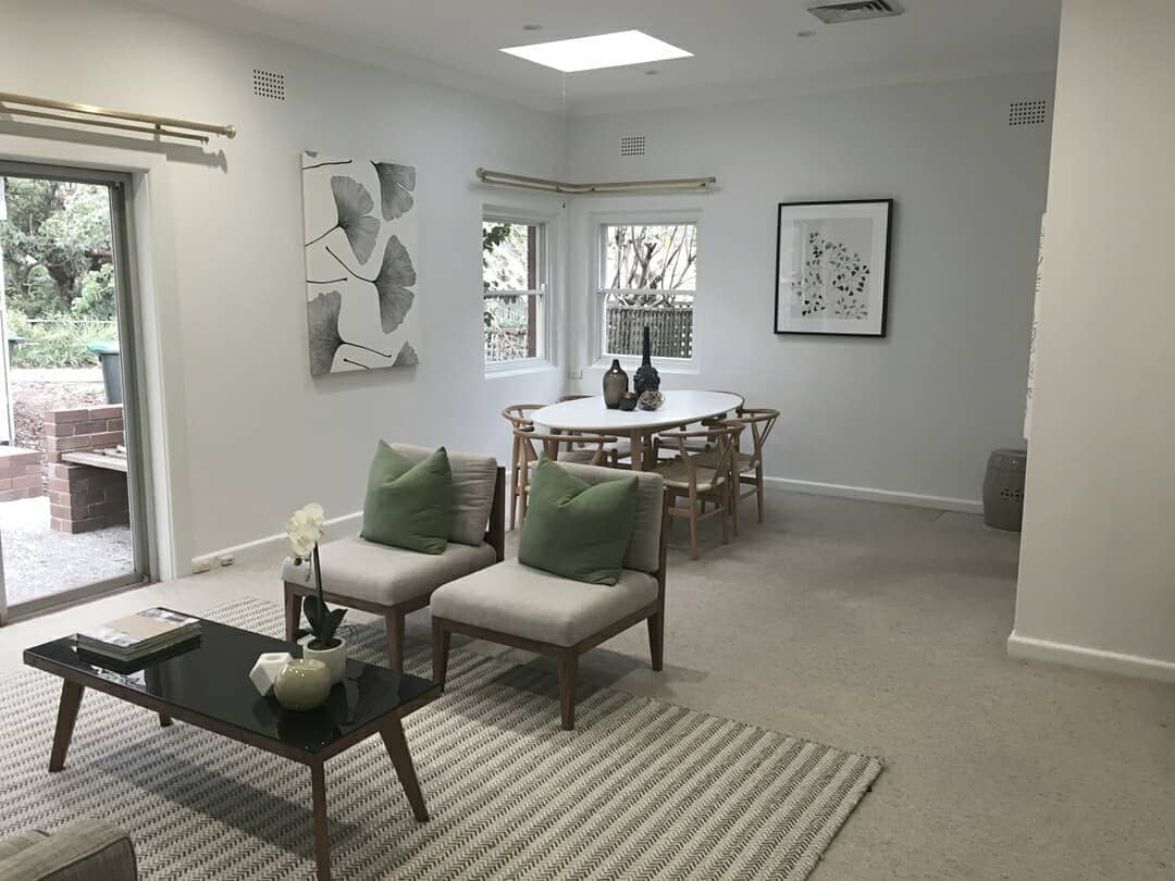 10. Soft Amber Glow: a Dining Nook Bathed In Natural Light with a Rattan Accent