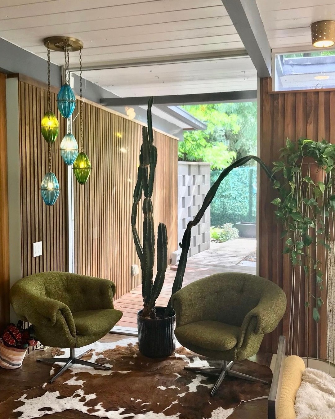 15. Mid-century Modern Living Room with Geometric Walnut Coffee Table and Ochre Velvet Sofa