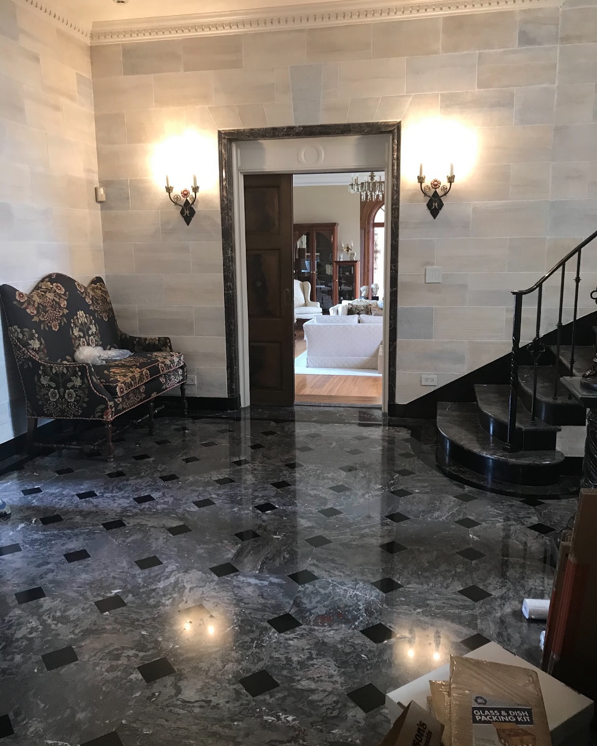 20. Velvet Crimson Curtains Frame a Sunlit Geometric Mirror In a Cozy Foyer