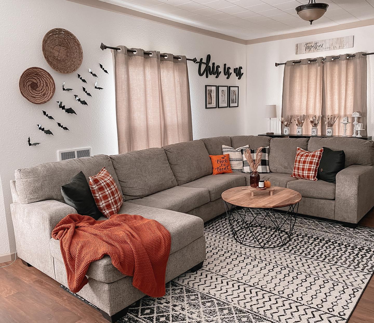 15. Autumnal Elegance: Pumpkin Spice and Maple Leaves Wreath with Rustic Wooden Accents