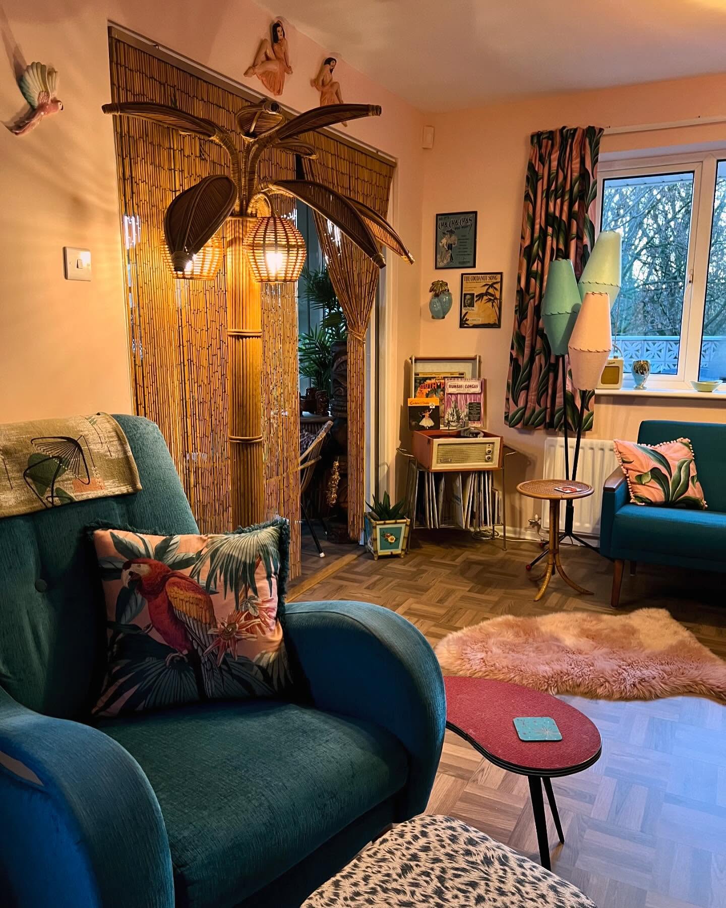 11. Mid-century Meets Moss: a Living Room with a Suspended Green Canopy