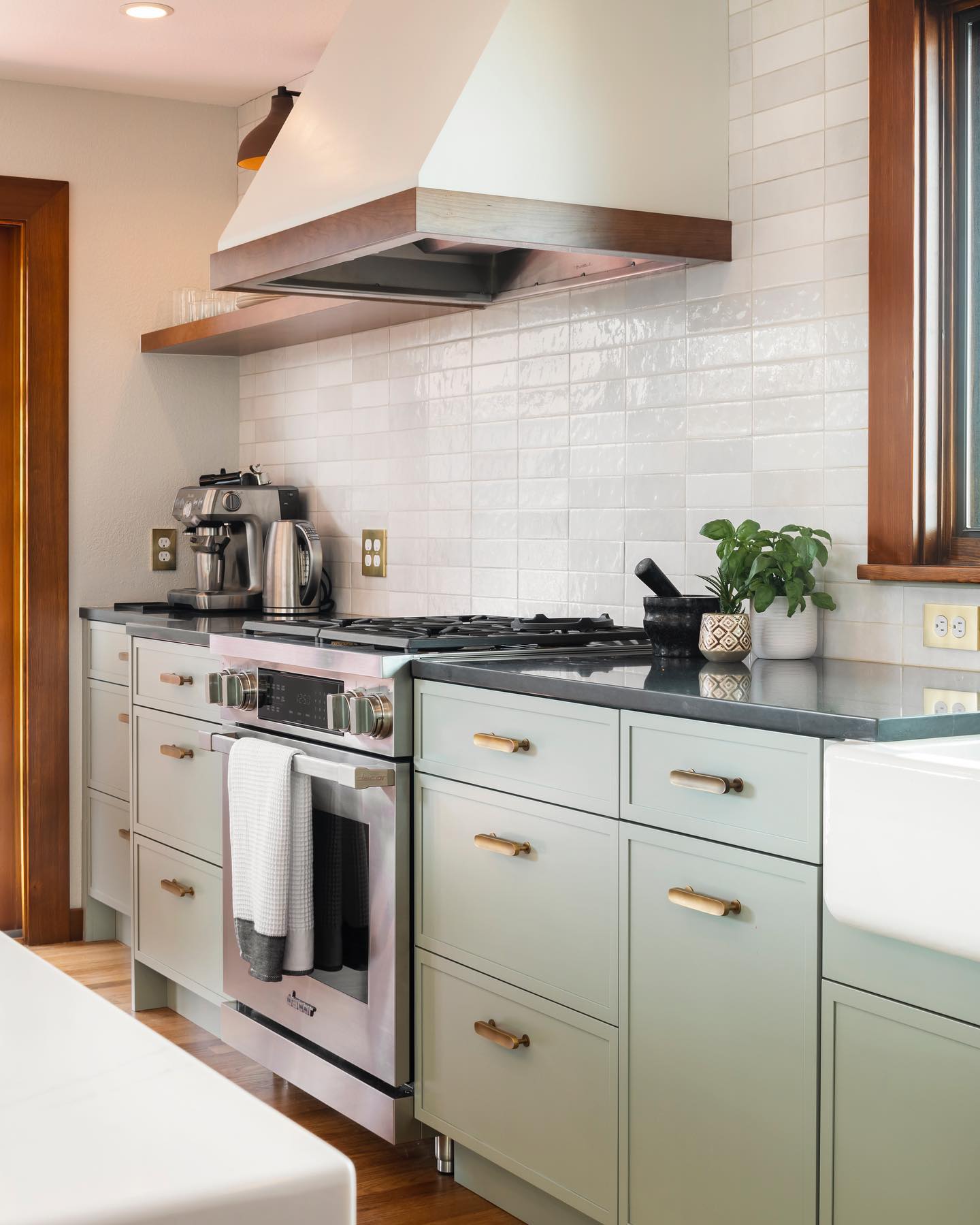 7. White Subway Tiles with Charcoal Grout and Rustic Wooden Shelves