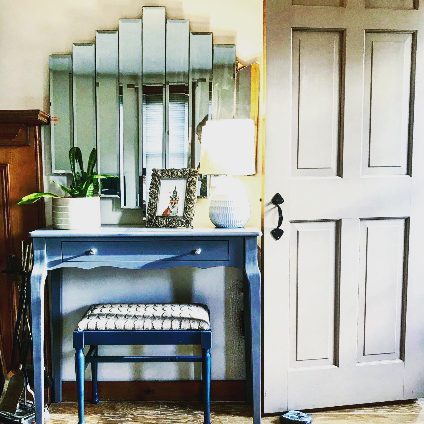 5. Moonlit Serenity: a Vanity with a Circular Mirror and Vintage Brass Accents