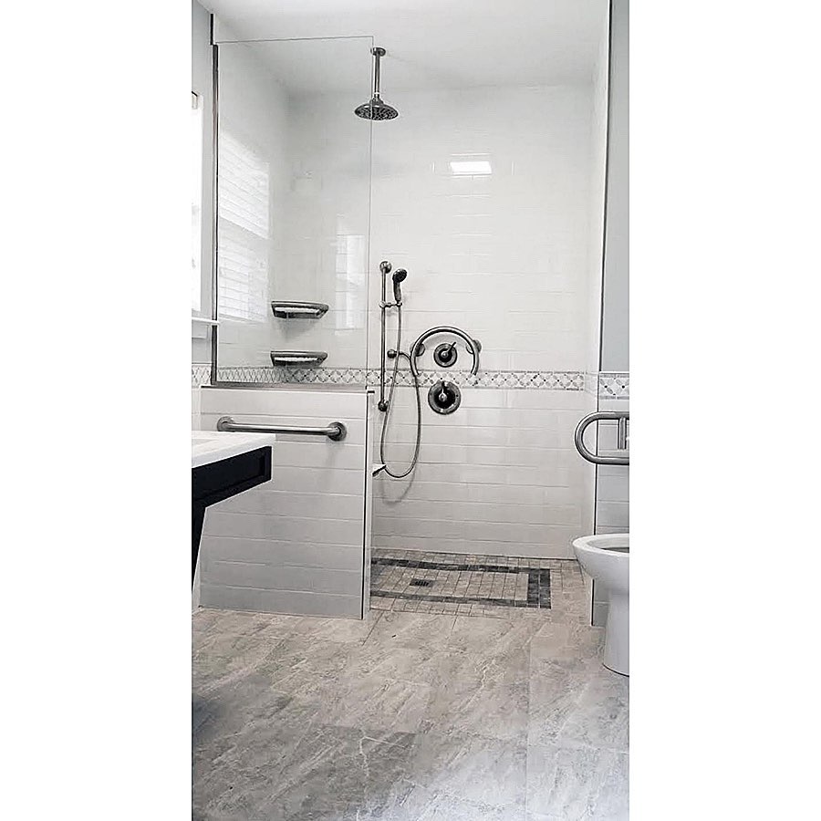 7. Midnight Blue Mosaic Tiles and Chrome Fixtures Create a Celestial Shower Nook