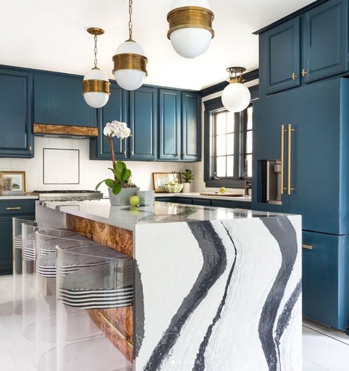 23. Turquoise Cabinets with Copper Hardware and Geometric Backsplash In a Sunlit Kitchen