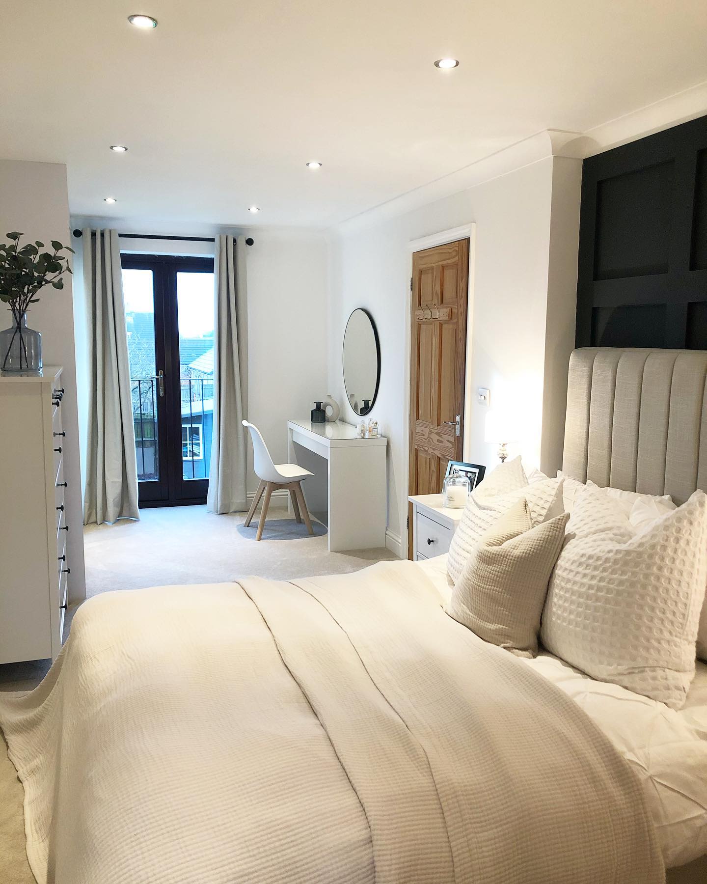 29. Twinkling Fairy Lights and Floral Canopy Over a Cozy Reading Nook