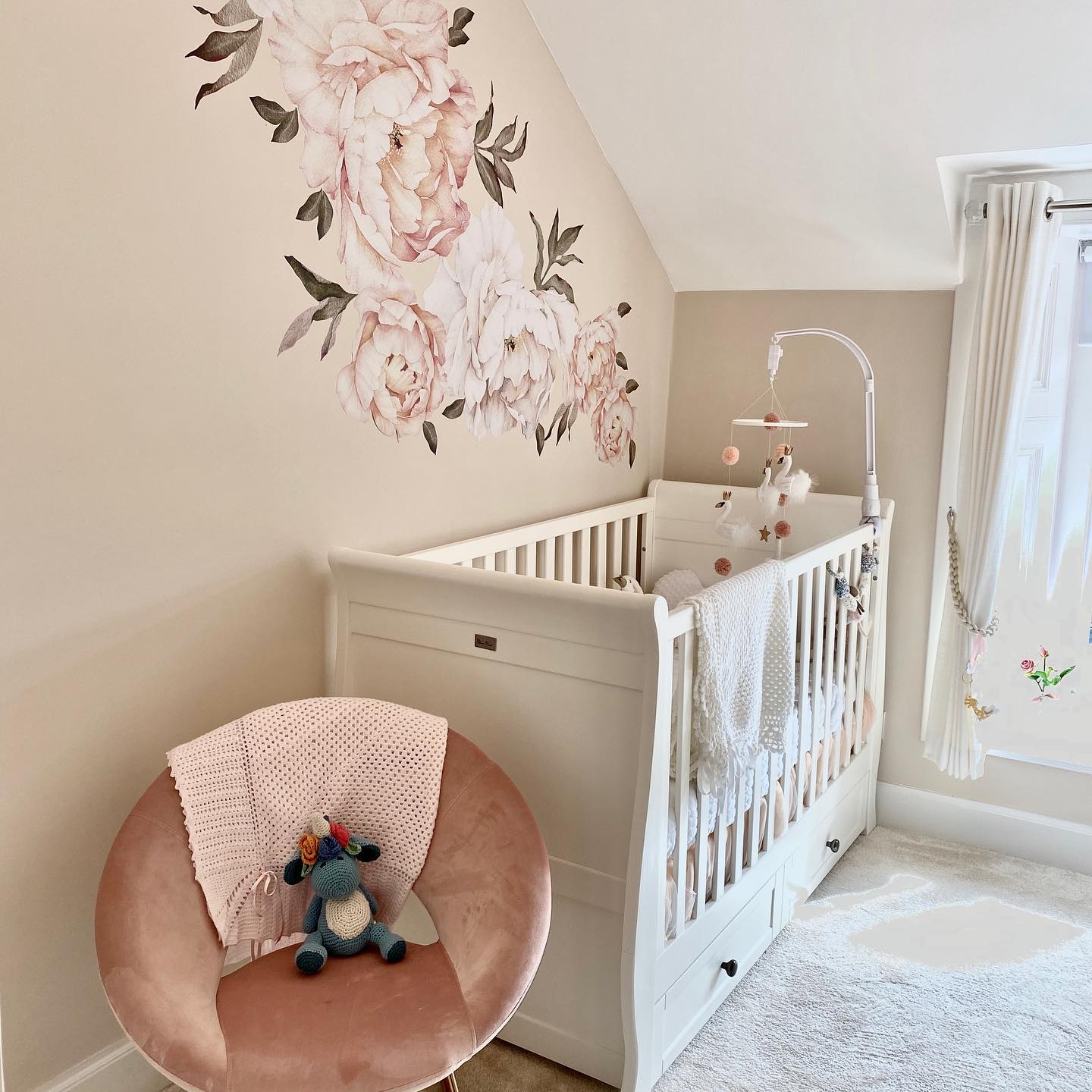 3. a Cactus and Watercolor Mobile Hovering Over a Mint Crib