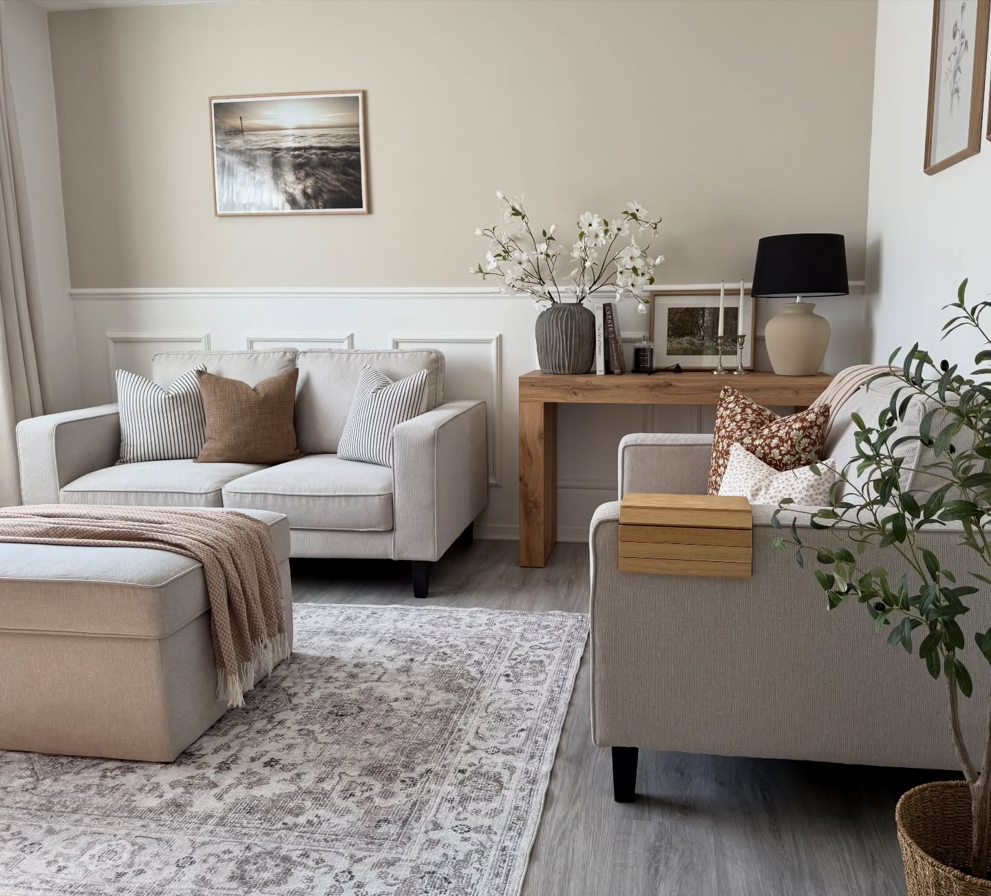 12. a Velvet Plum Sofa Embraced by Geometric Gold Wall Art In a Cozy Nook