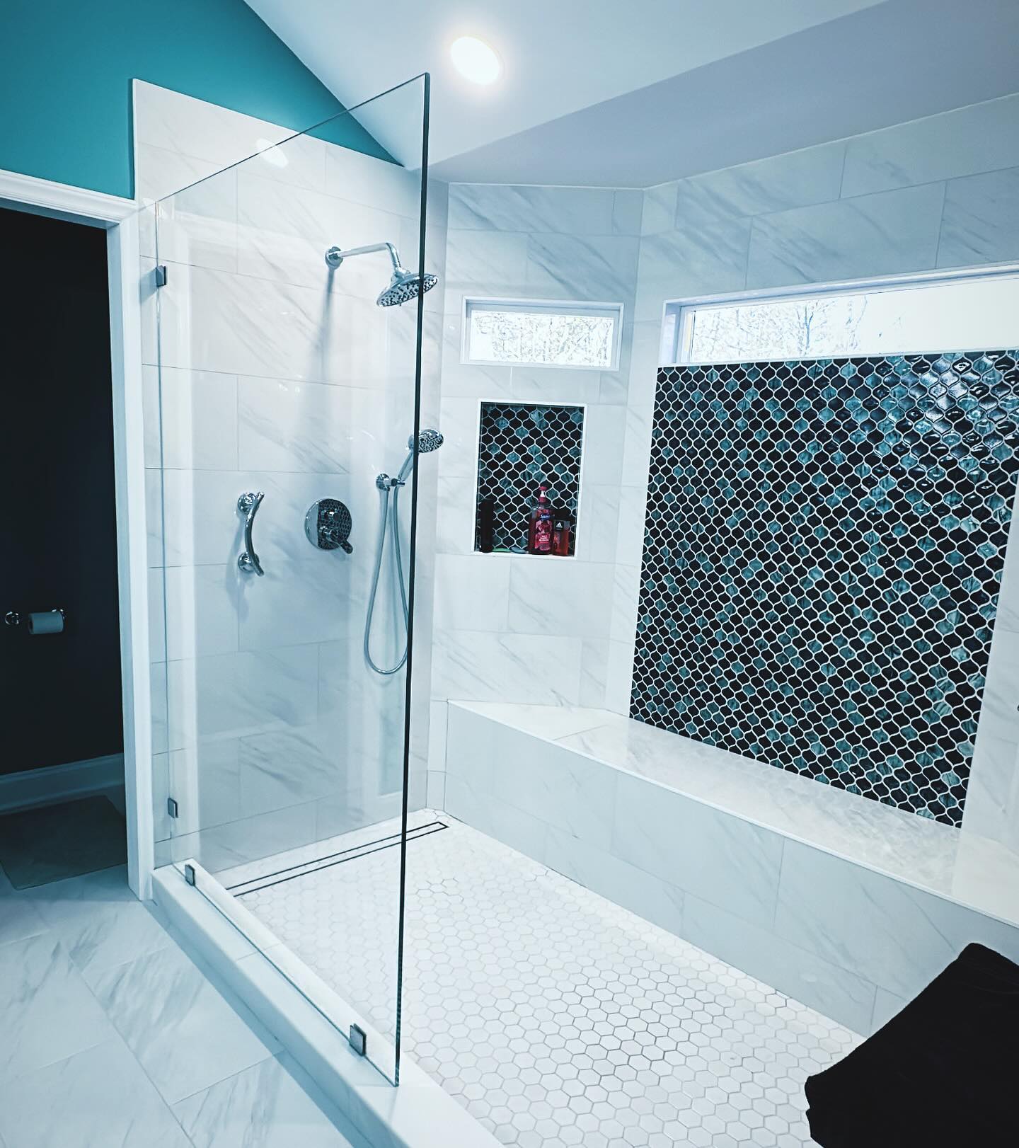 8. Midnight Bloom Shower Nook with Mosaic Accents and Dual Rainfall Heads