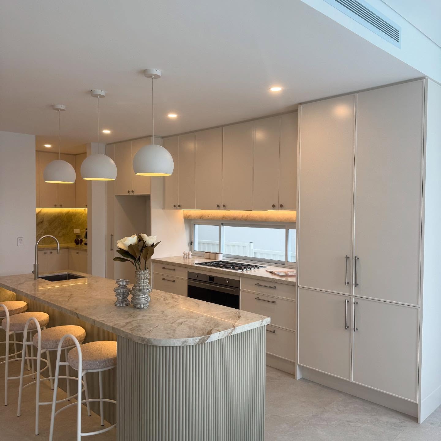 17. Midnight Mosaic Kitchen Island with Embedded Stone Accents