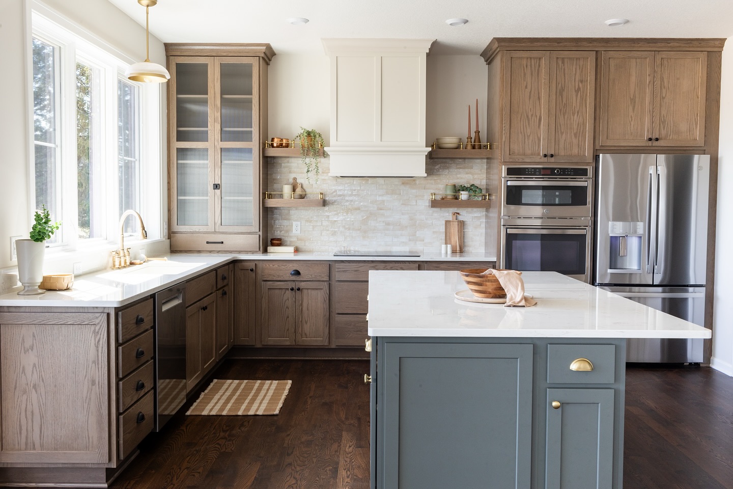 26. a Marble Mosaic Of Midnight and Mocha with Brass Accents