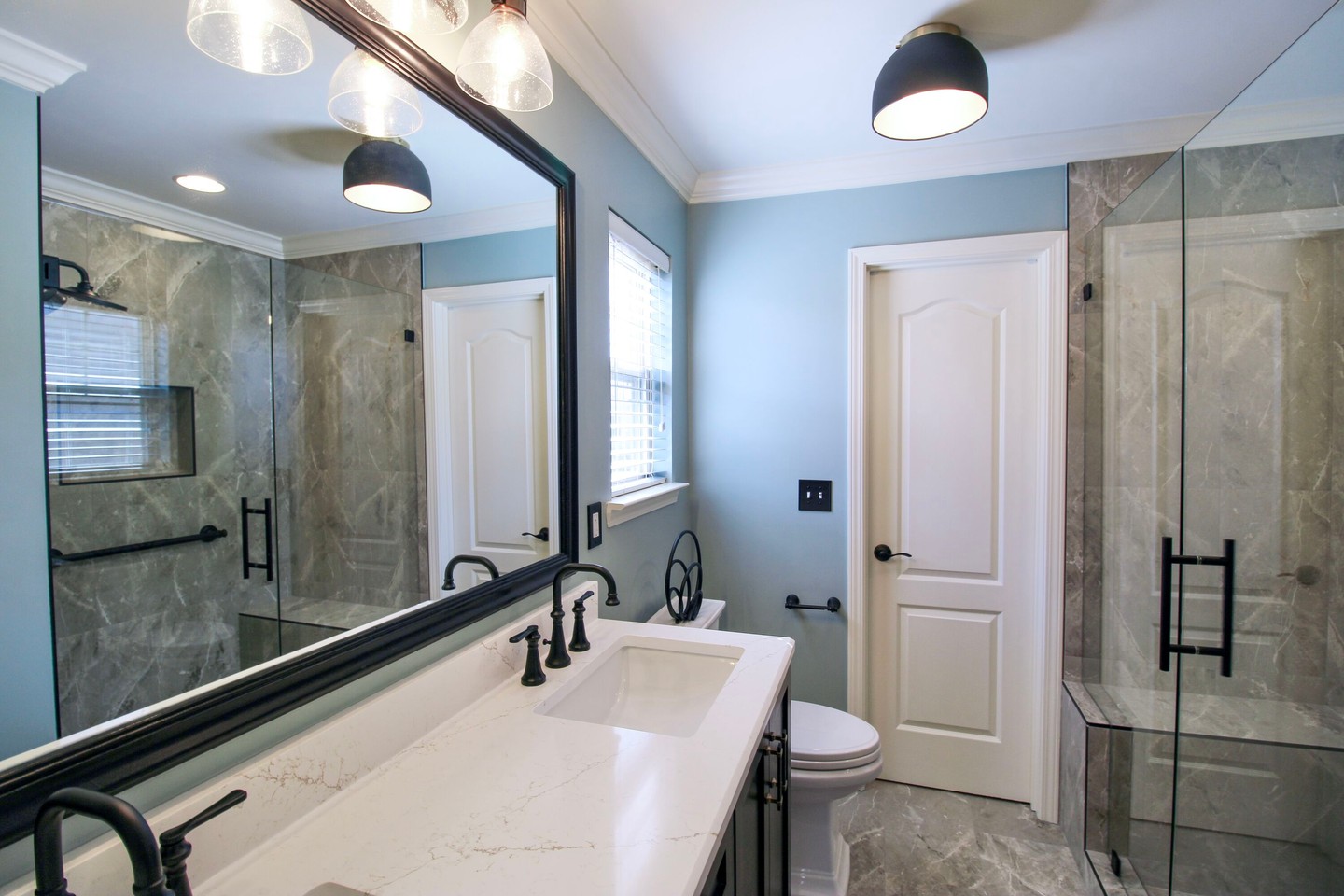 21. a Teal-tiled Alcove with Industrial Piping and Eclectic Storage Solutions