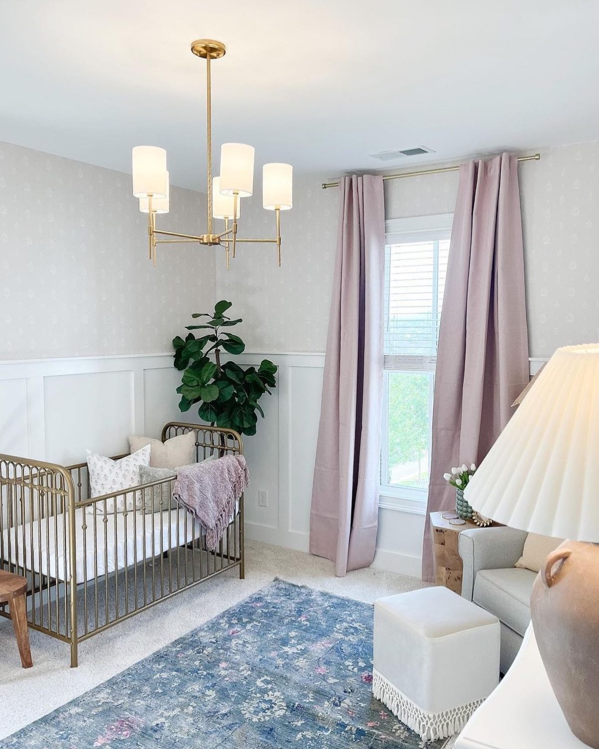 27. a Canopy Of Stars and Moons Over a Crib In Soft Blue Hues