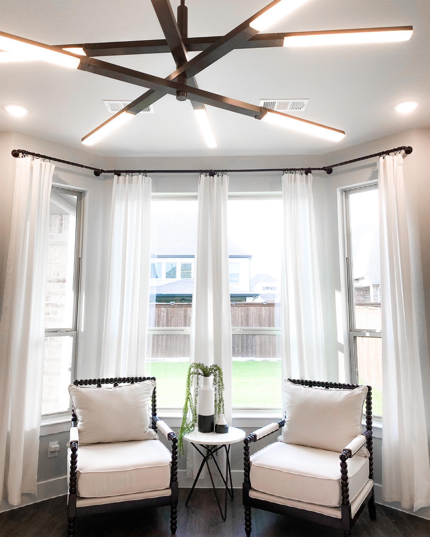 13. Velvet Cushions and Golden Glow: a Cozy Bay Window Retreat