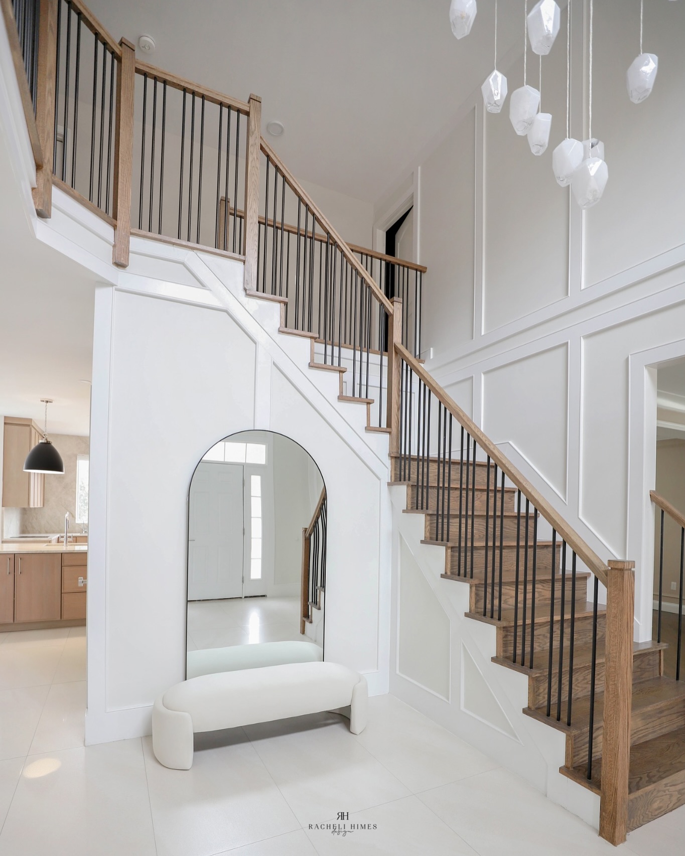 22. a Symphony Of Curves: the Swirling Staircase and Moonlit Mirror In a Foyer