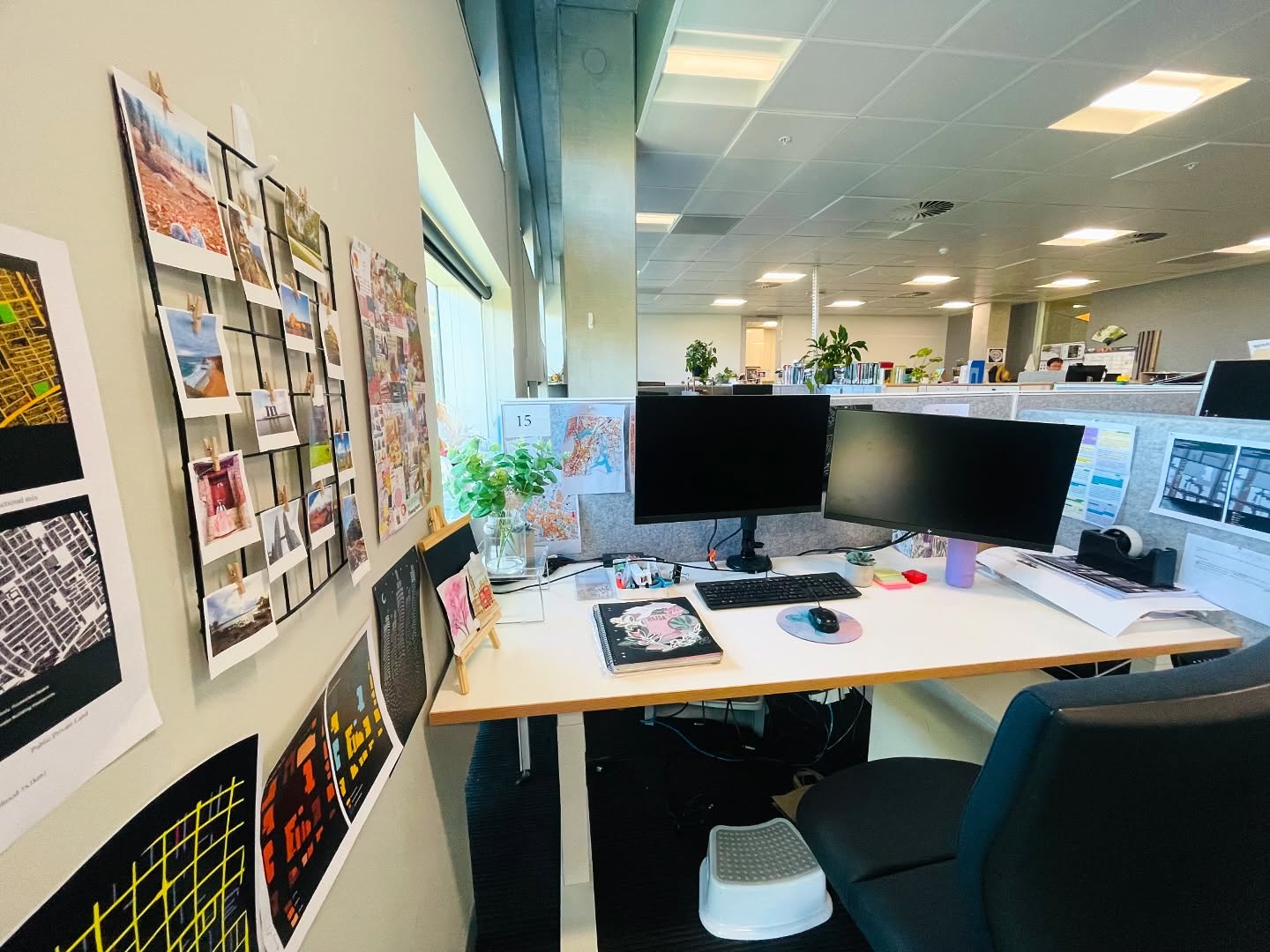 29. Vibrant Cactus and Geometric Print Fusion on Cubicle Wall