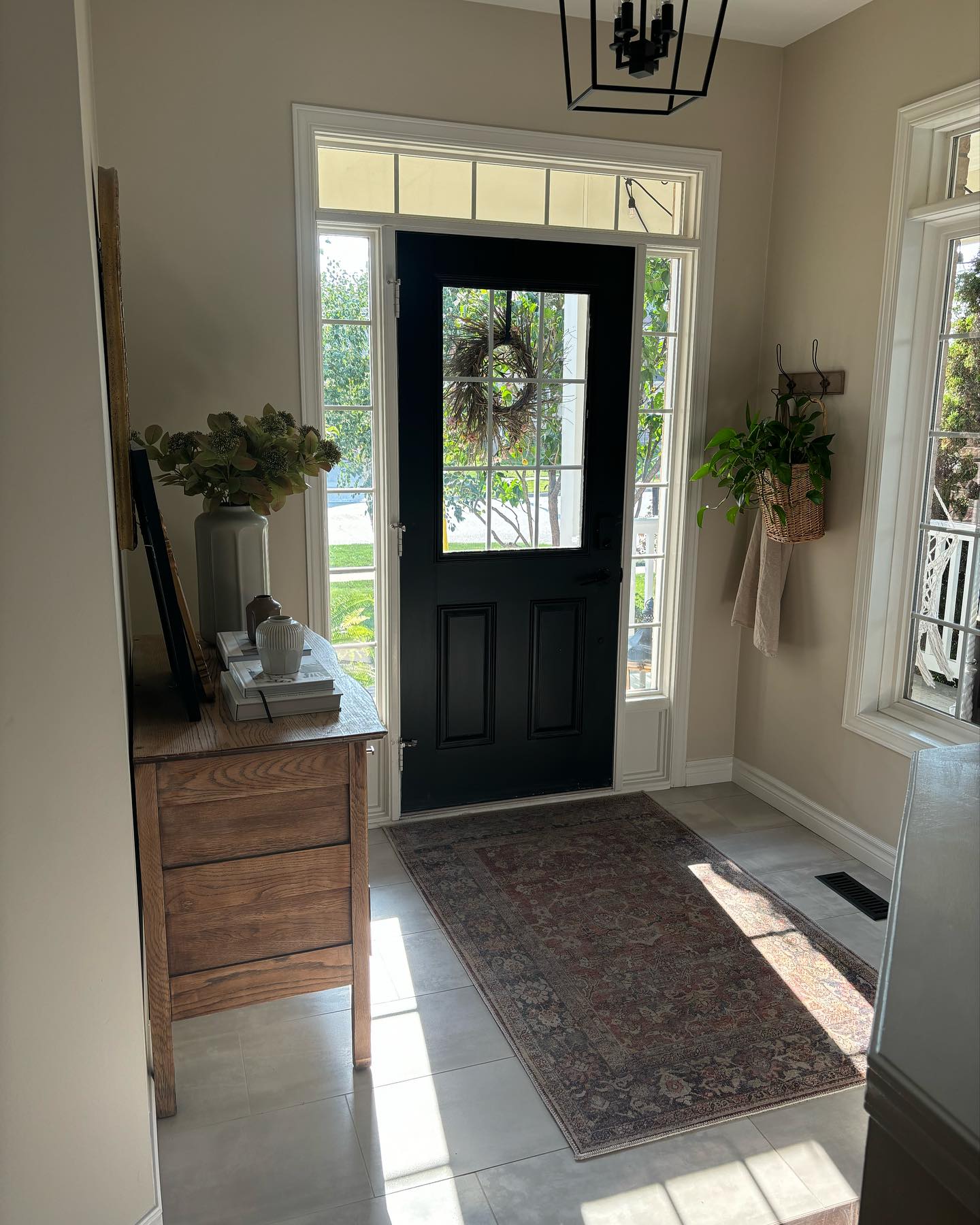 26. the Cerulean Chandelier and Crimson Console: a Foyer Fusion