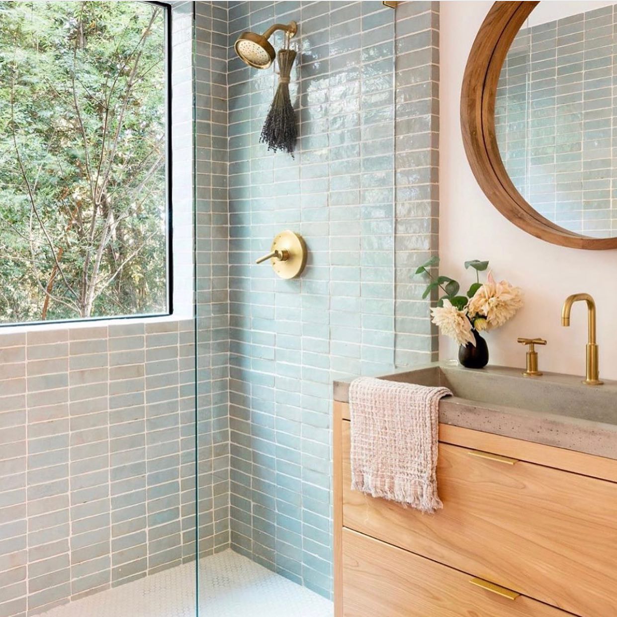 18. Cascading Waterfall Over River Stones In a Minimalist Alcove