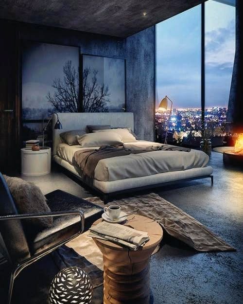 24. Moonlit Romance: a Bedroom with a Circular Window and Metallic Accents
