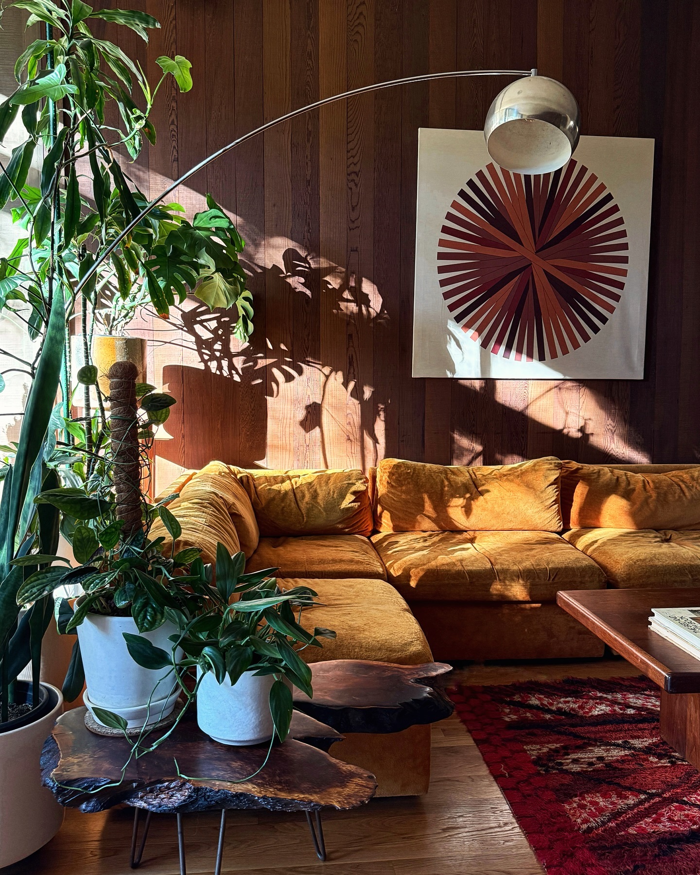 4. Vintage Typewriter and Geometric Art Fusion In a Mid-century Living Room